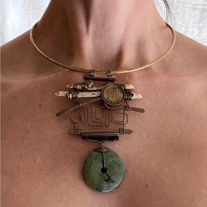 Unique Artisan Necklace with Green Stone and Gold Accents